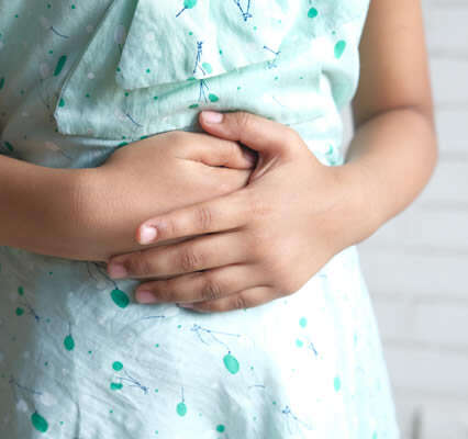 Child holding stomach